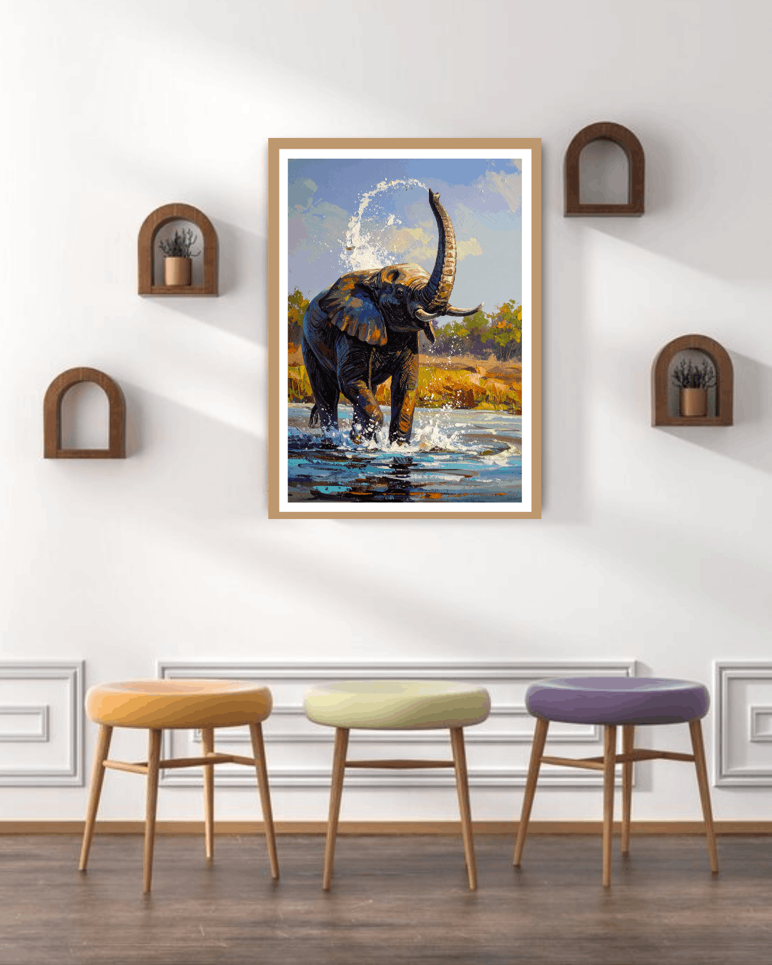 Framed artwork of an elephant in a natural setting on a wall above three colorful stools.