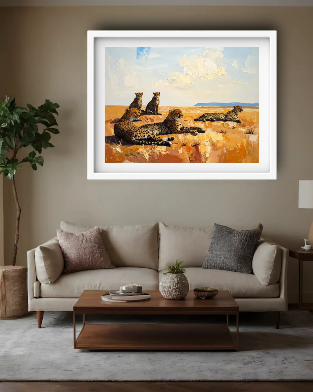 Living room with a painting of leopards on the wall above a sofa.