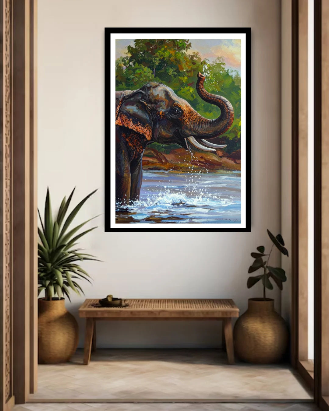 Framed painting of an elephant by a river in a room with plants and a bench.