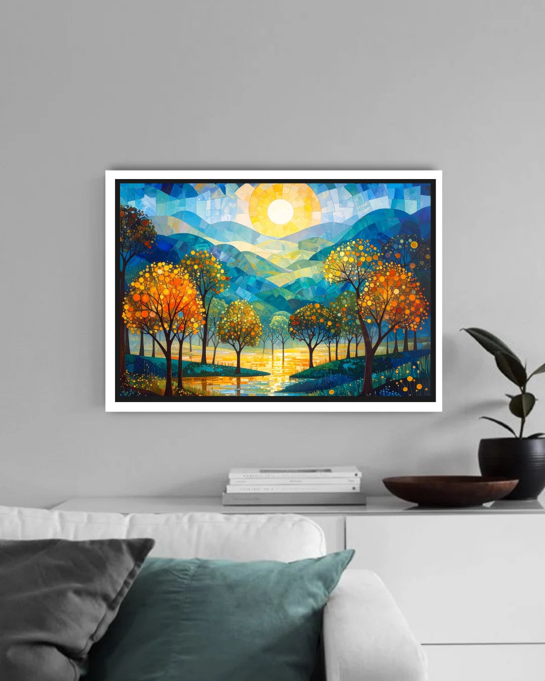 Framed abstract landscape painting on a wall above a white sofa.