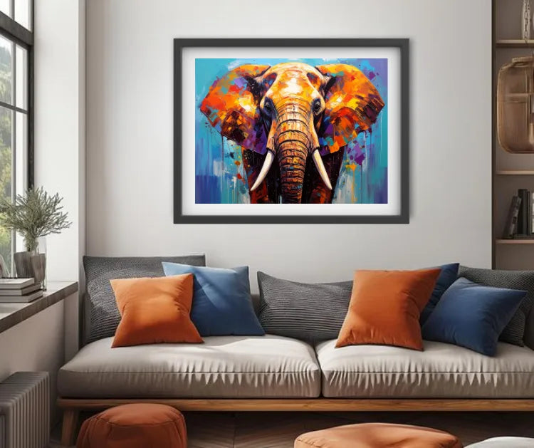 Colorful elephant painting on a wall above a sofa with decorative pillows.