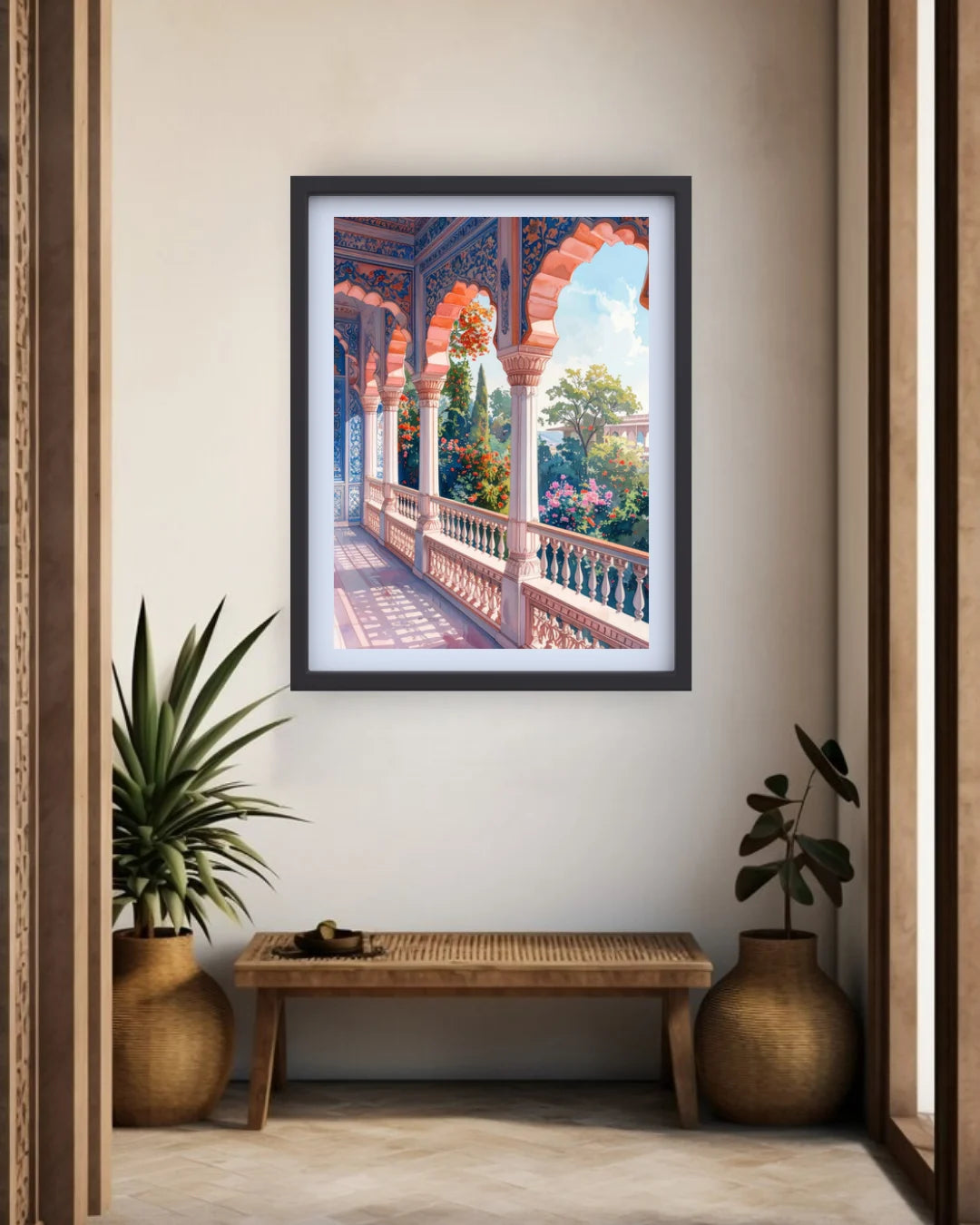A framed art print depicting a vibrant Moroccan-style archway corridor with lush greenery and a blue sky, displayed on a beige wall above a wooden bench with potted plants.