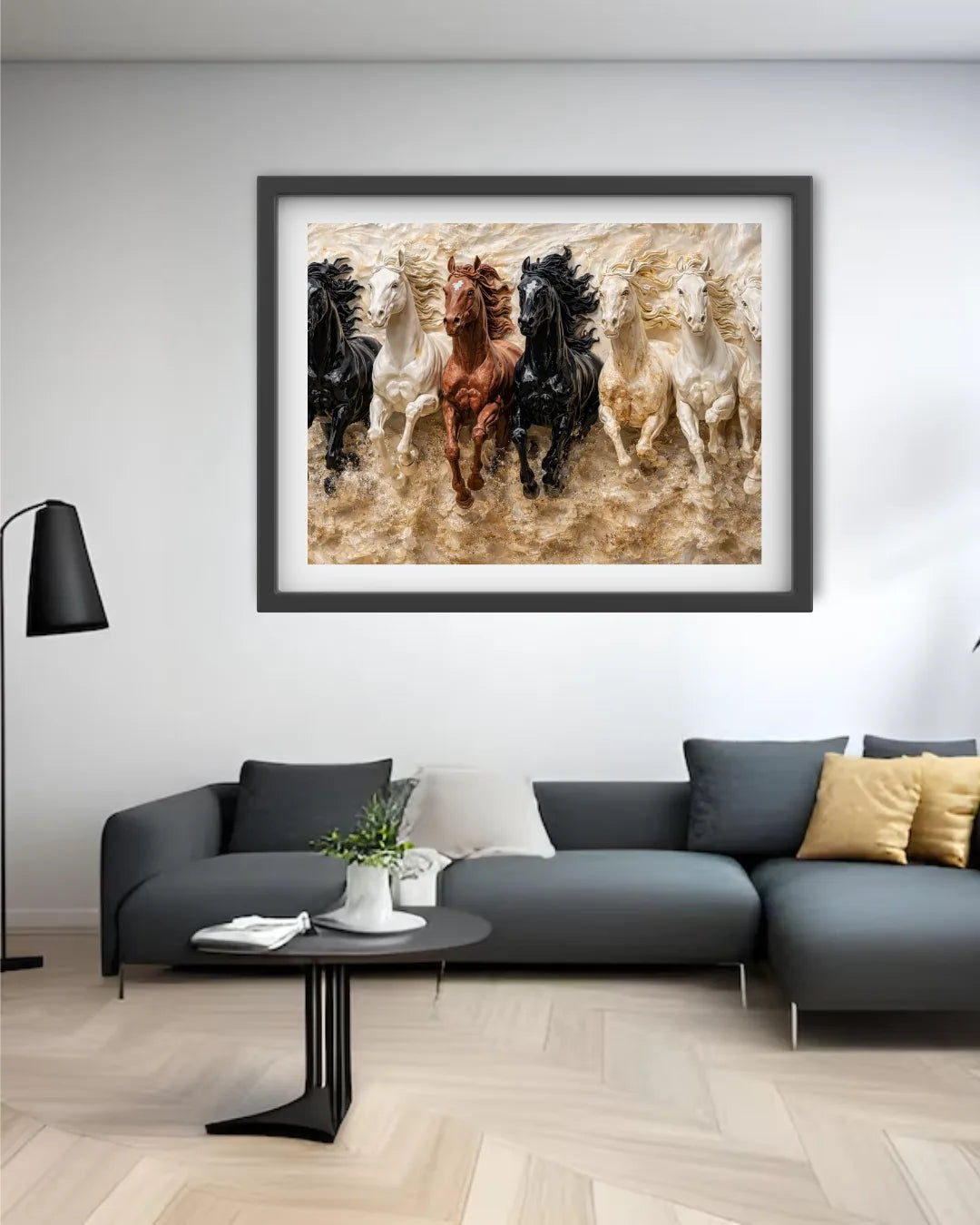Framed artwork of horses running in water above a modern living room setup.