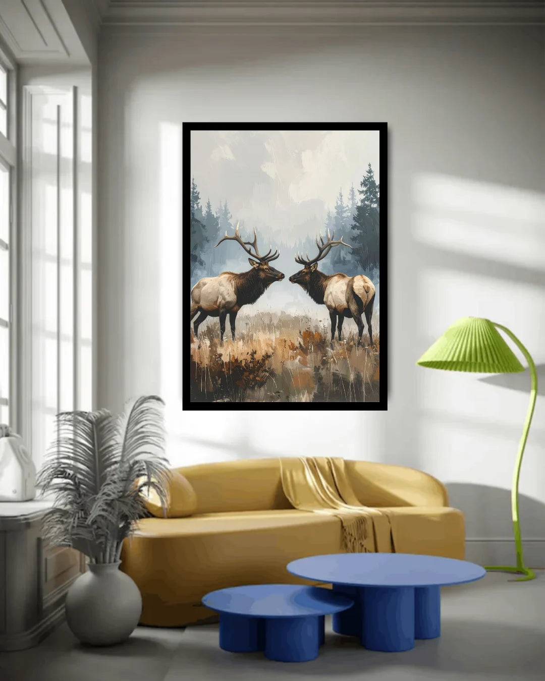 Living room with a yellow sofa, blue tables, and a framed artwork of two elk on the wall.
