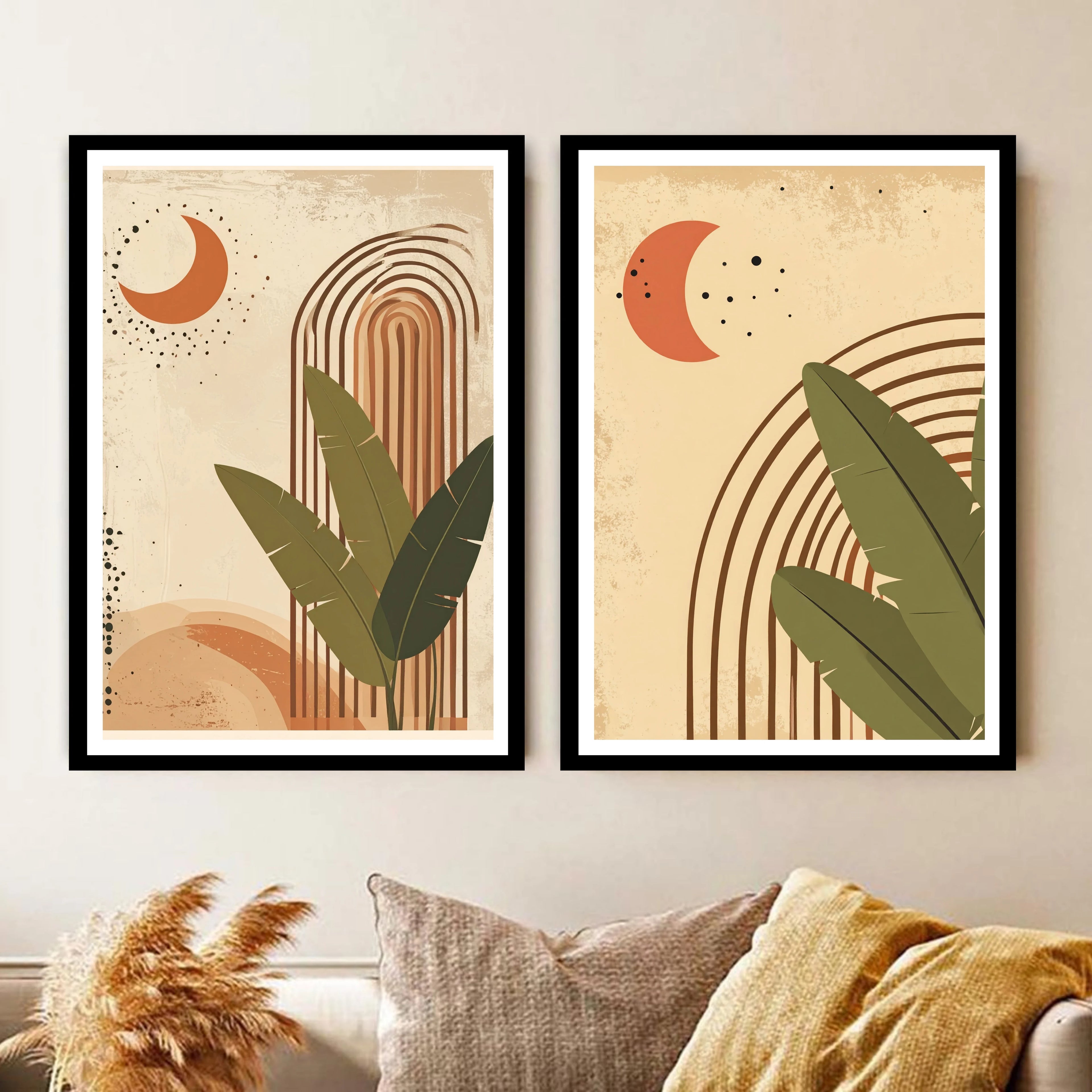 Two abstract art prints with leaves and arches on a wall above a sofa.