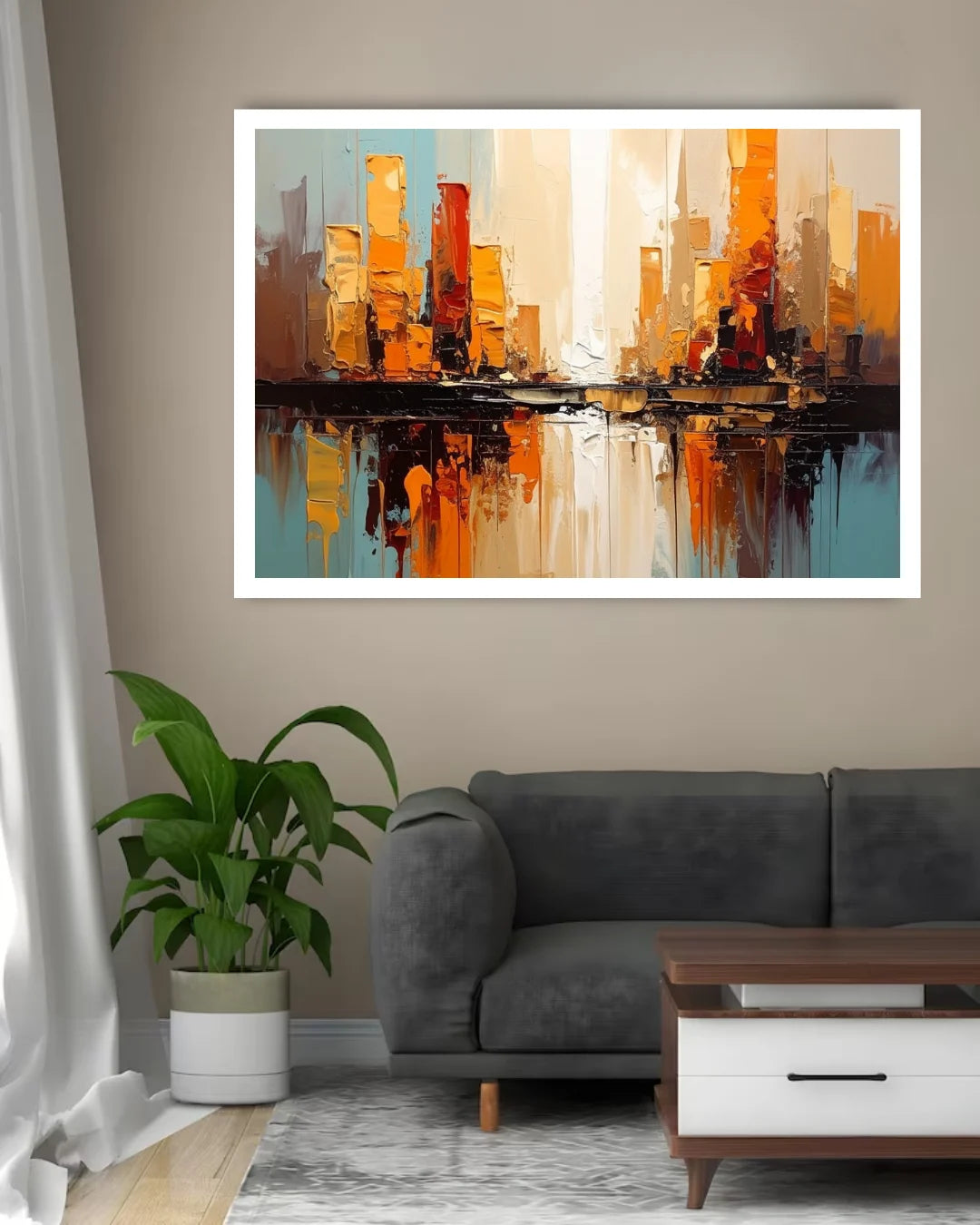 An abstract cityscape canvas print with orange, yellow, and blue tones, displayed on a beige wall above a gray sofa and next to a green potted plant.