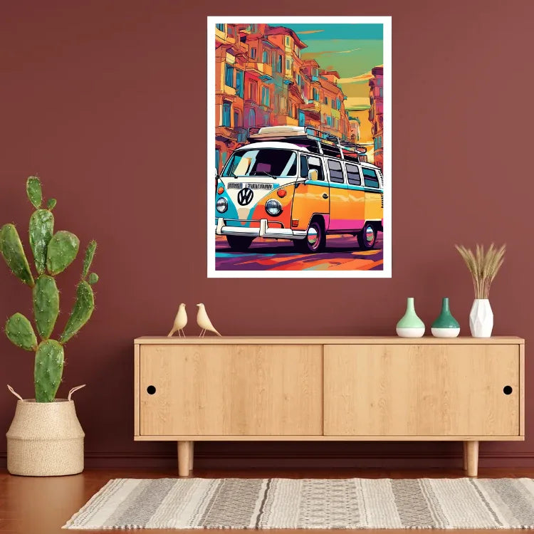 A colorful pop-art poster of a vintage VW bus in a street scene, displayed on a dark brown wall above a light wood console table with decorative items.
