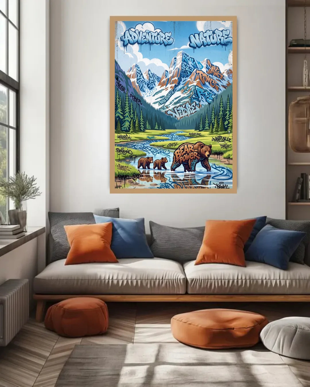 Poster of bears and nature scene on a wall above a sofa with colorful cushions.