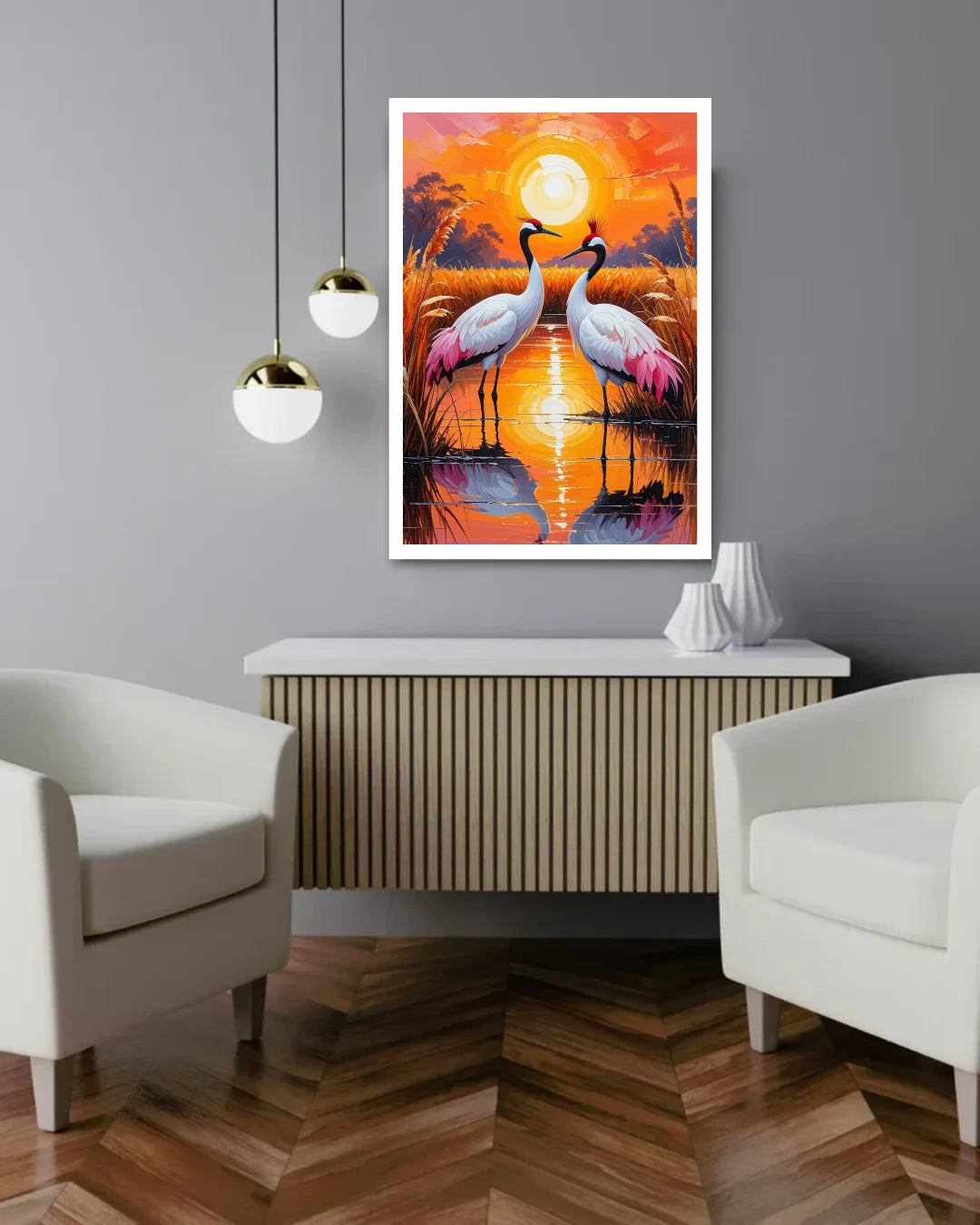 Framed artwork of two birds on a sunset background in a modern living room.