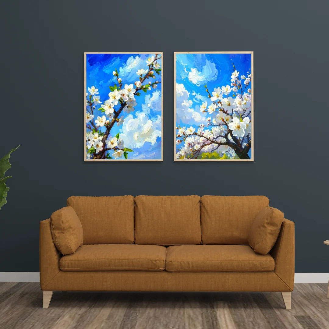 Blue blossom floral wall art canvas set displayed on a dark wall above a sofa