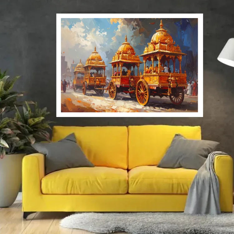 A framed art print depicting three ornate golden chariots under a blue sky, displayed on a dark gray wall above a yellow sofa in a living room setting.