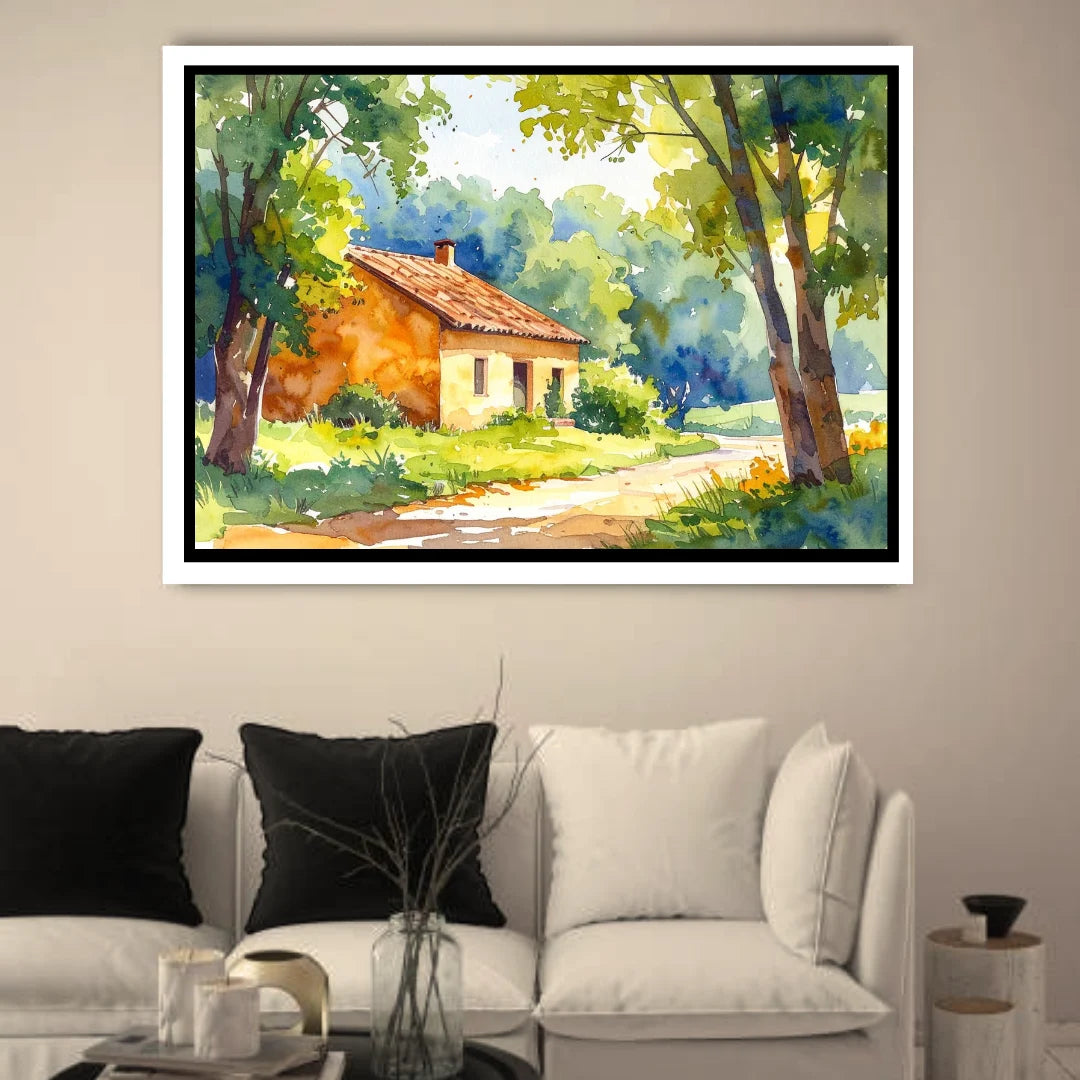 Framed landscape painting of a house in nature above a sofa