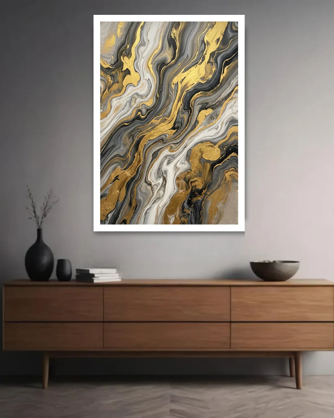 Abstract art print on a wall above a wooden console table.