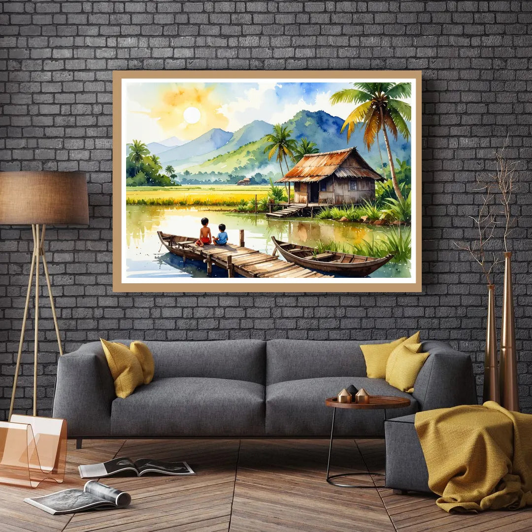 Framed painting of a tropical scene with a hut and boat on a wall above a gray sofa.