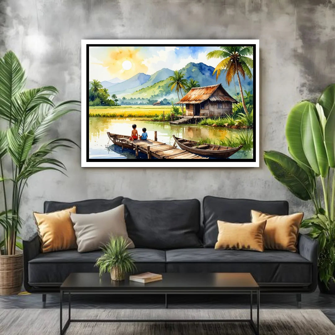 Framed tropical landscape painting above a black sofa with decorative pillows.