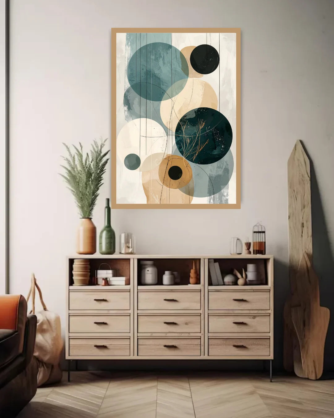 Room interior with a wooden dresser, abstract wall art, and decorative items.