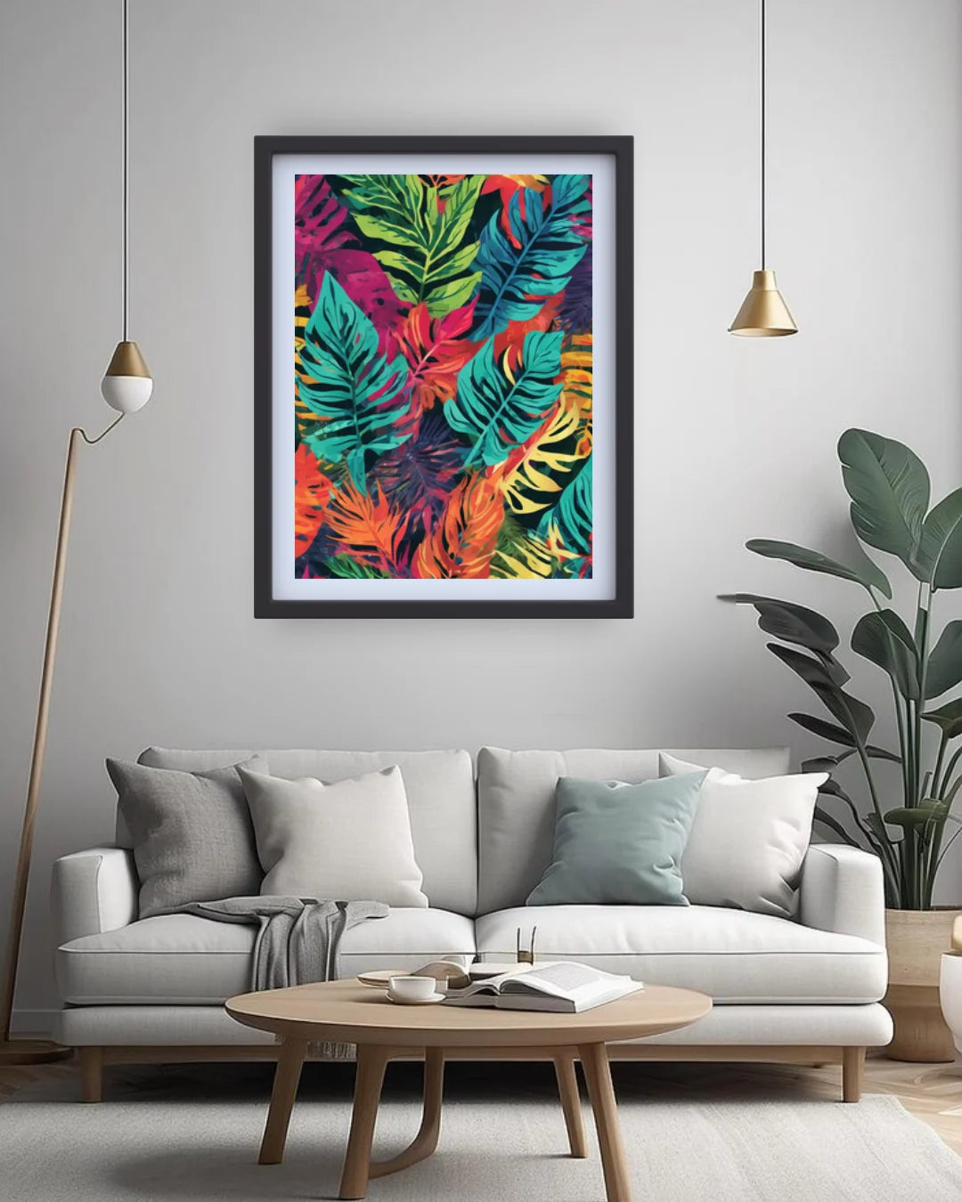 Colorful abstract leaf print framed on a wall above a white sofa in a living room.