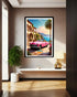 Framed artwork of a pink car on a beach scene in a modern interior setting.