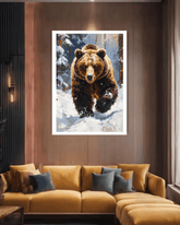 Framed artwork of a bear in a snowy forest on a wall above a brown sofa.