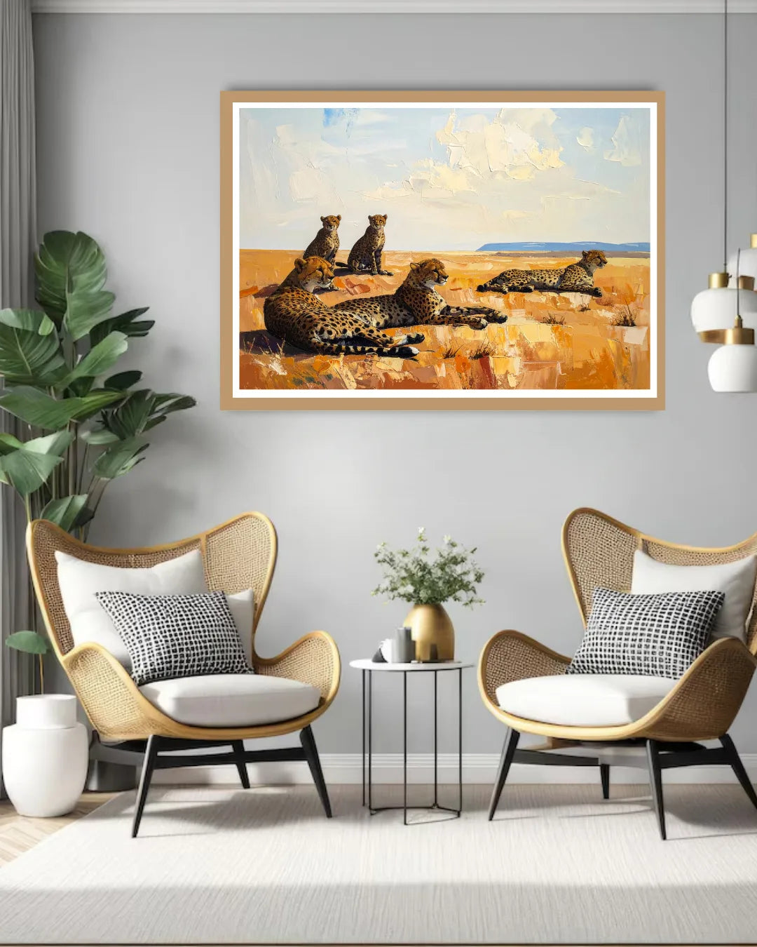 Two wicker chairs with white cushions in a room with a framed painting of leopards on a gray wall.
