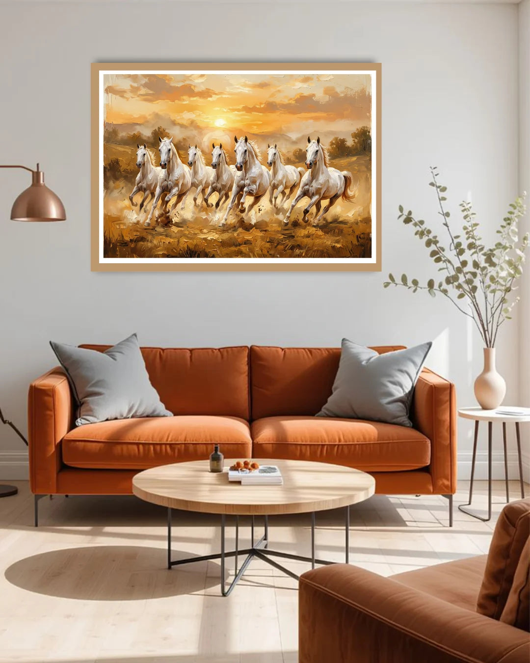 Living room with a brown sofa, round coffee table, and a large framed painting of running horses on the wall.