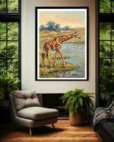 Framed painting of a giraffe in a natural setting on a wall in a room with a chair and plants.