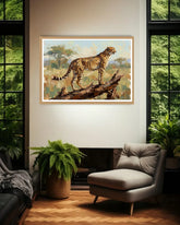 Framed painting of a cheetah on a log in a living room setting with a fireplace and plants.