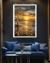 Framed artwork of a tree by the sea with a sunset, displayed above a blue sofa in a living room.