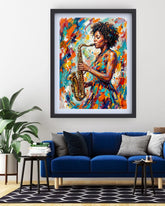 Framed artwork of a woman playing saxophone in a colorful style, hanging above a blue sofa in a living room.