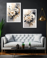 Living room with a gray sofa, coffee table, and floral wall art.