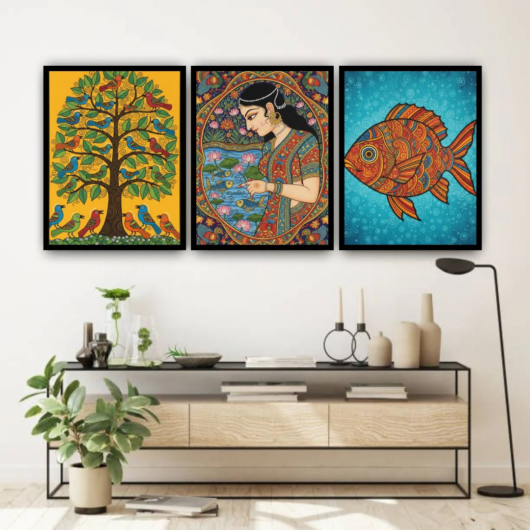 Three colorful framed artworks above a wooden console table in a room.