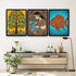 Three colorful framed artworks above a wooden console table in a room.