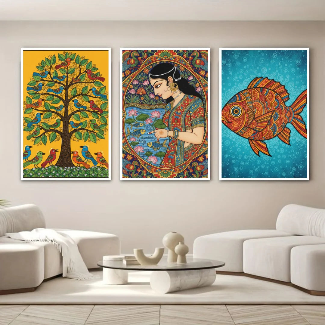Three colorful framed artworks on a wall in a living room.