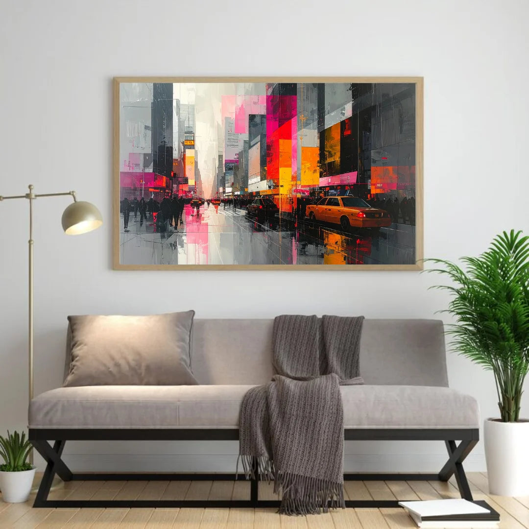 Colorful abstract cityscape canvas painting displayed above a modern grey sofa.