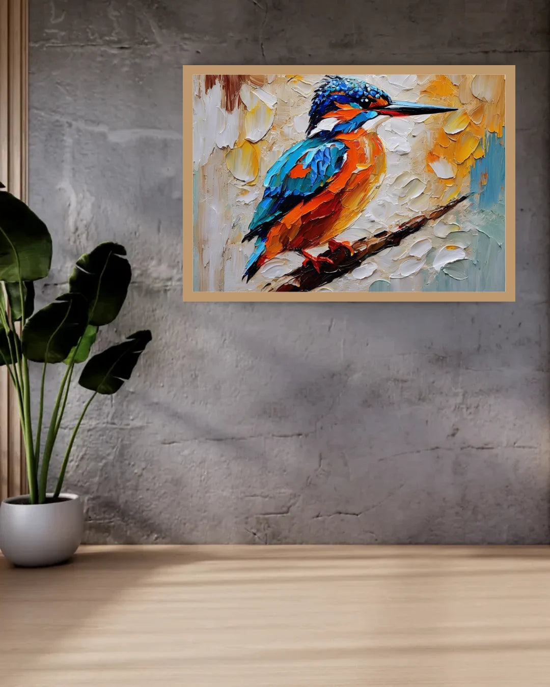Colorful painting of a kingfisher on a wall with a plant below.