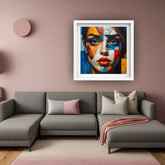 Contemporary abstract face wall art displayed above a sofa in a modern living room.