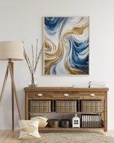 Contemporary abstract canvas artwork placed above a desk in a modern home office setup.
