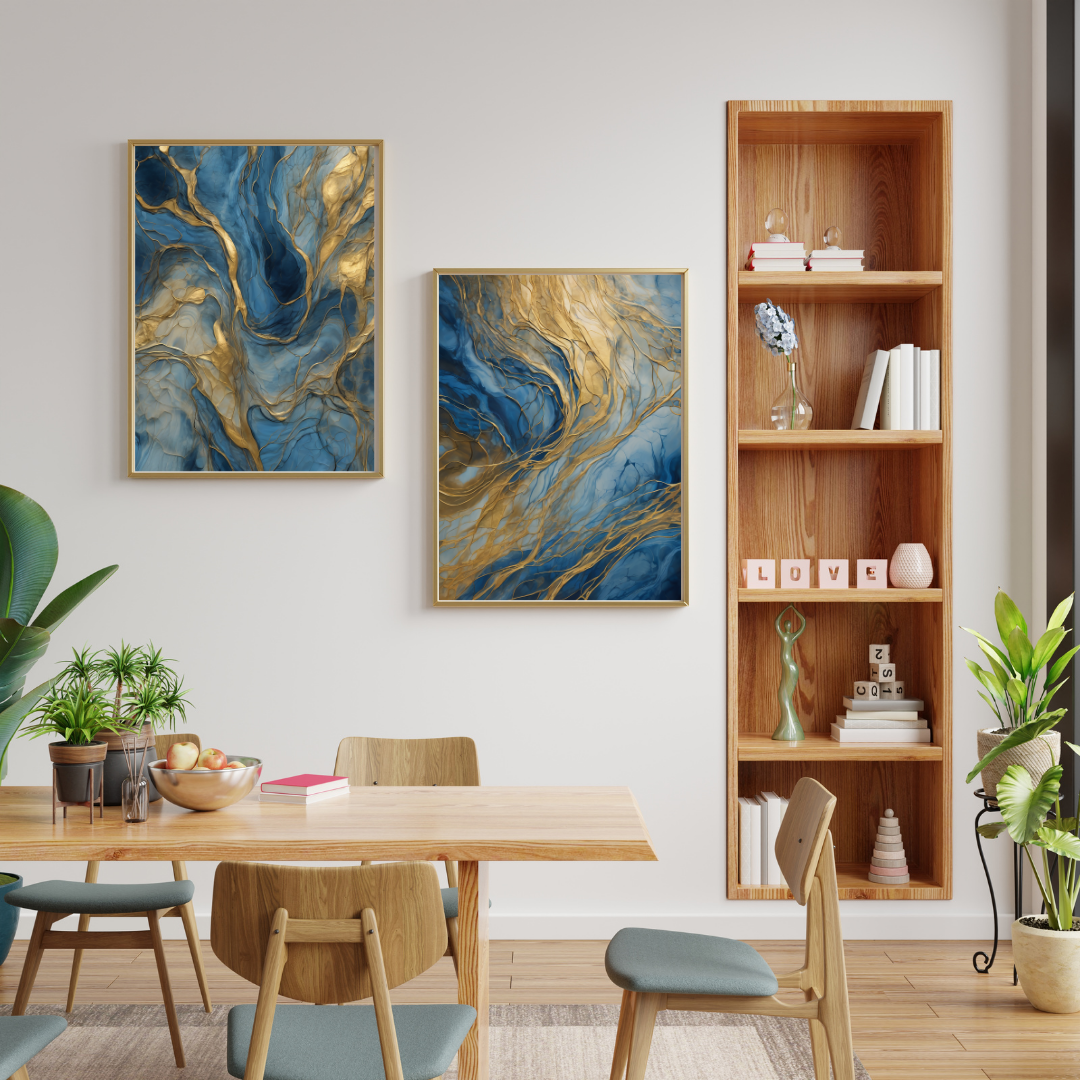 Blue and gold abstract canvas set mounted above a wooden cabinet in a stylish interior.