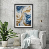 Elegant abstract blue and gold canvas painting showcased in a bright modern living room.