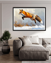 Framed artwork of a fox in mid-jump on a wall above a sofa.