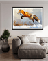 Framed artwork of a fox in mid-jump on a wall above a sofa.
