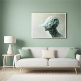 Figurative face wall art canvas above sofa
