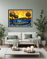 Framed abstract artwork above a white sofa in a living room with candles on a coffee table.