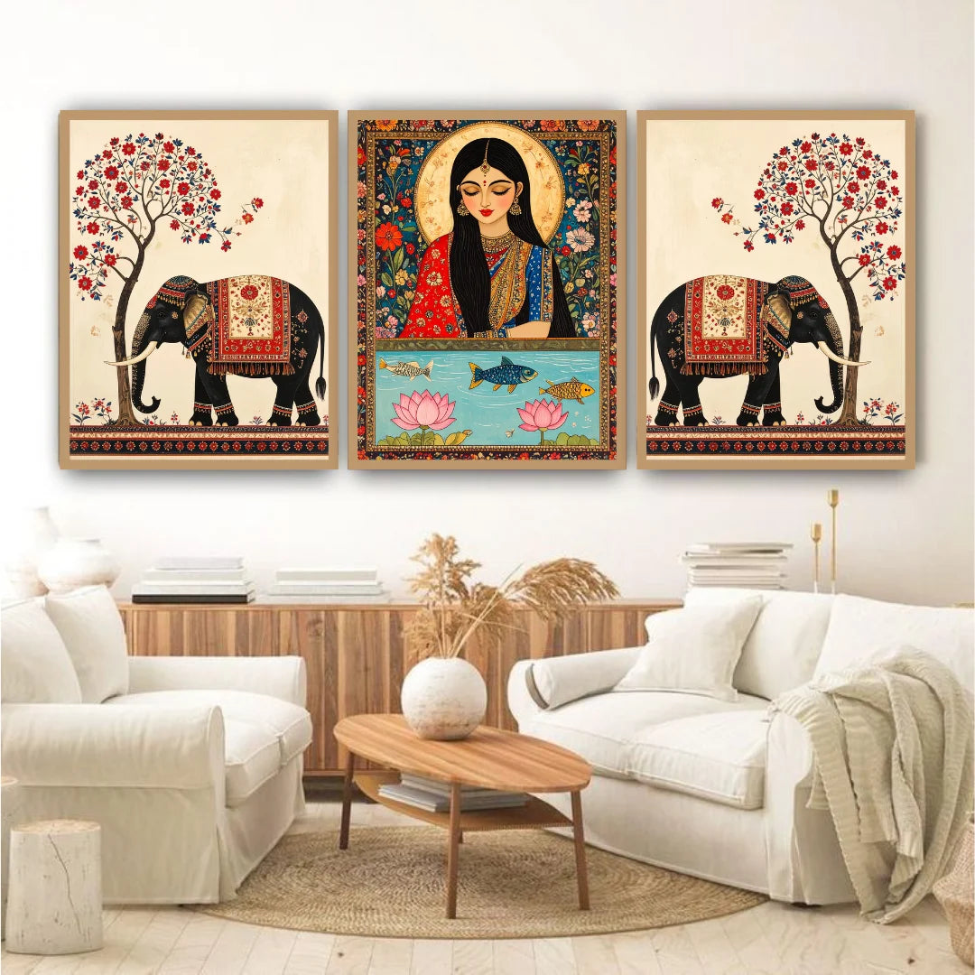Decorative wall art featuring elephants and a woman in a living room setting.
