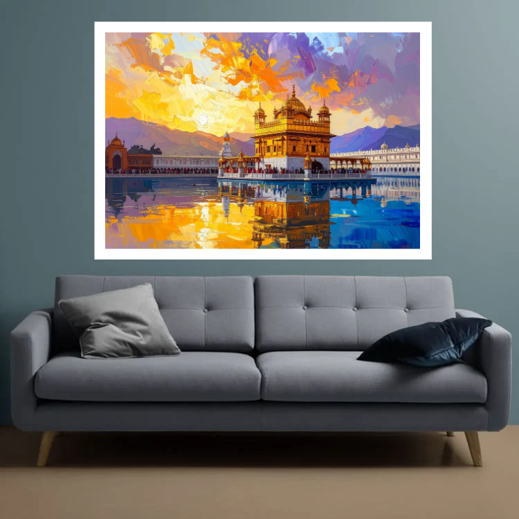 A framed colorful painting of the Golden Temple in Amritsar, displayed on a gray wall above a modern gray fabric sofa with two pillows.
