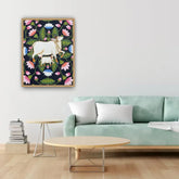 Living room with a light green sofa, wooden coffee table, and a colorful framed artwork of a cow and flowers on the wall.