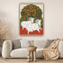 Framed artwork of two cows under an orange tree in a living room setting.