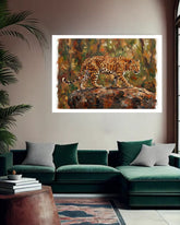 Wildlife cheetah canvas wall art hanging above a green sofa in a contemporary living room.