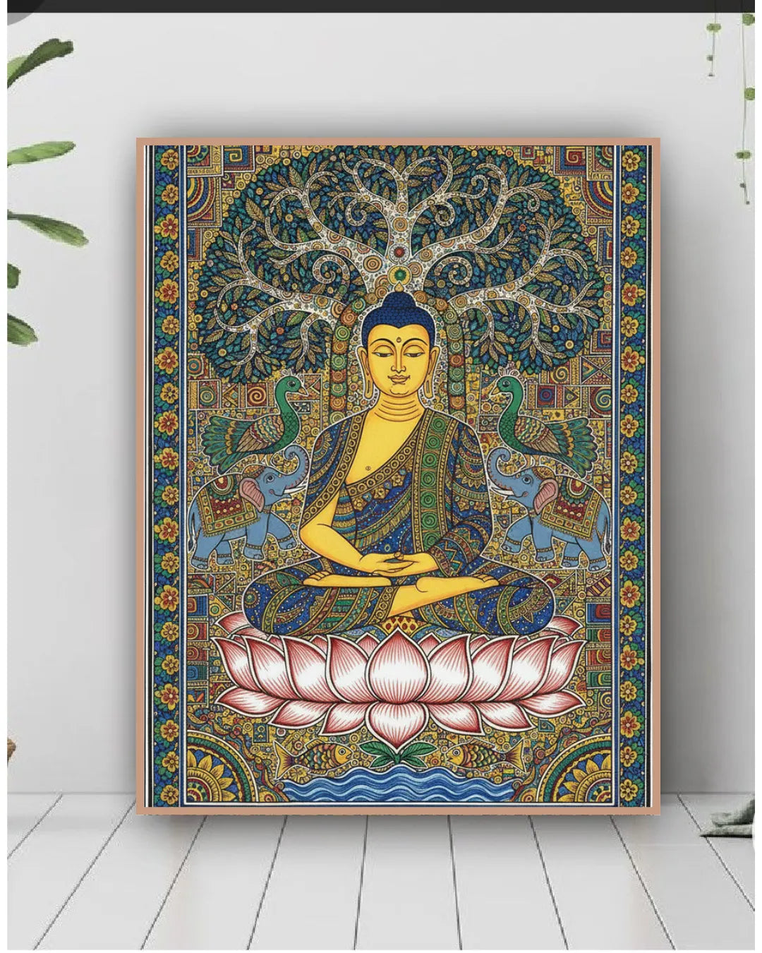 Colorful tapestry with a Buddha design on a white wall.
