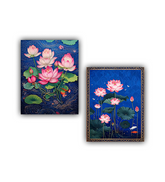 Two framed paintings of pink lotus flowers on a blue background.